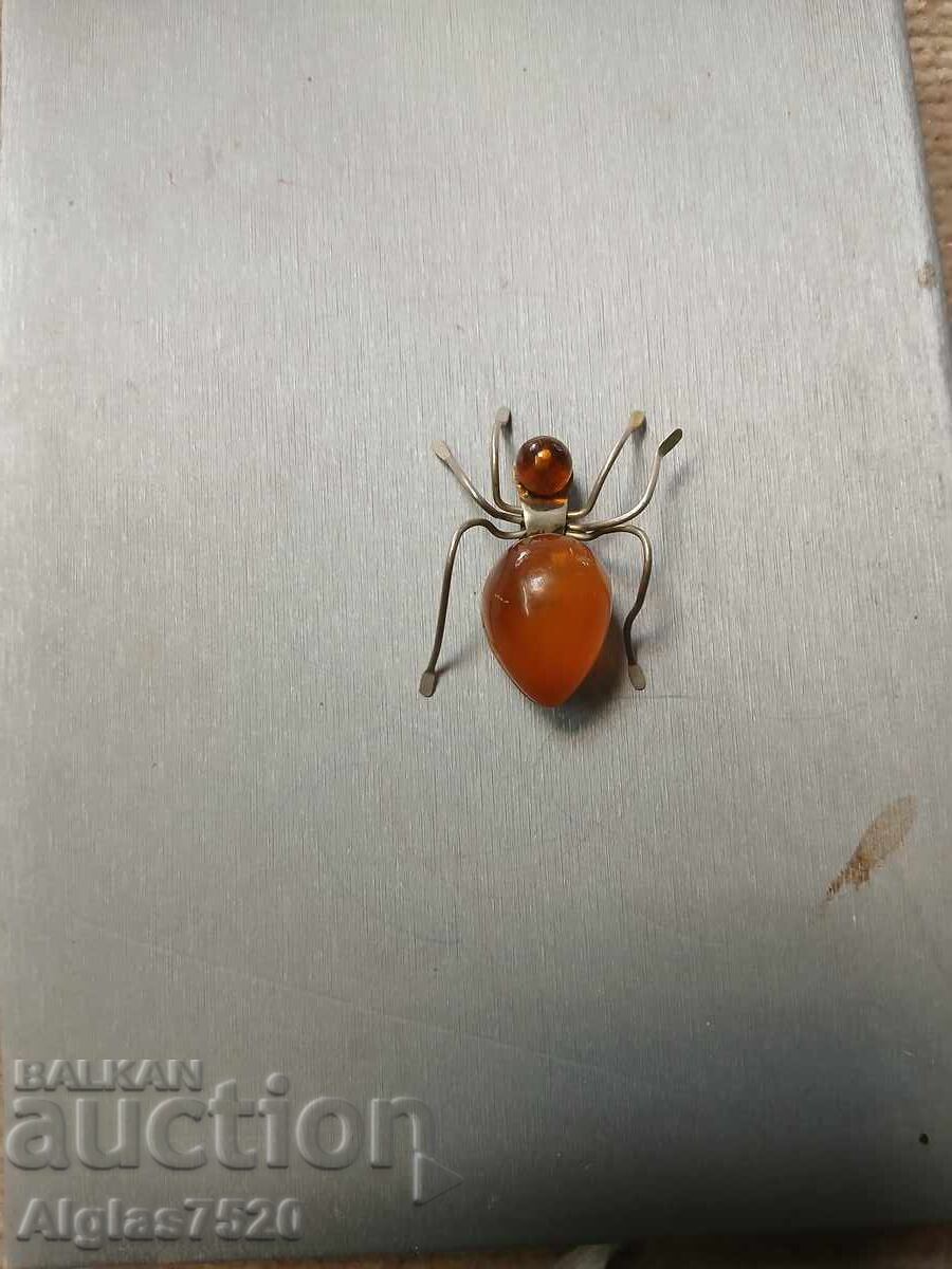 Old amber brooch "Spider"