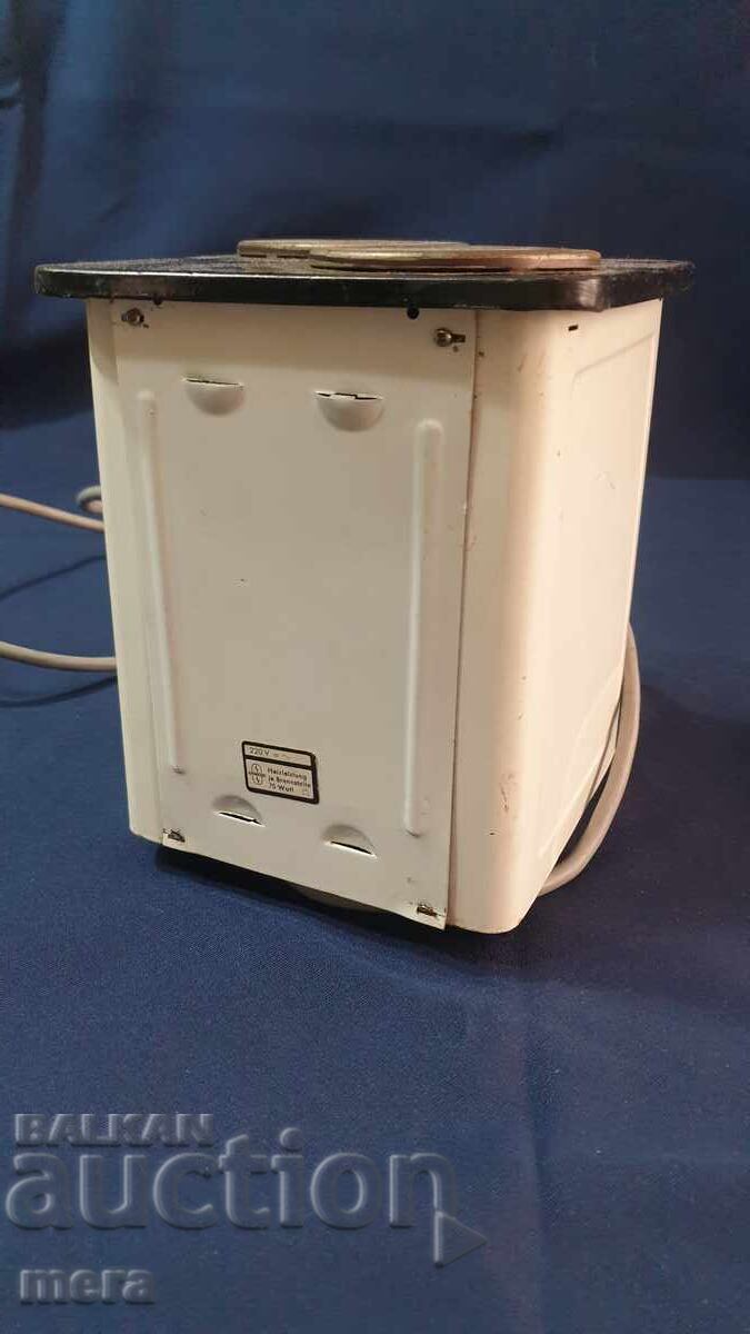 Delivery of Antique miniature advertising model of an electric stove