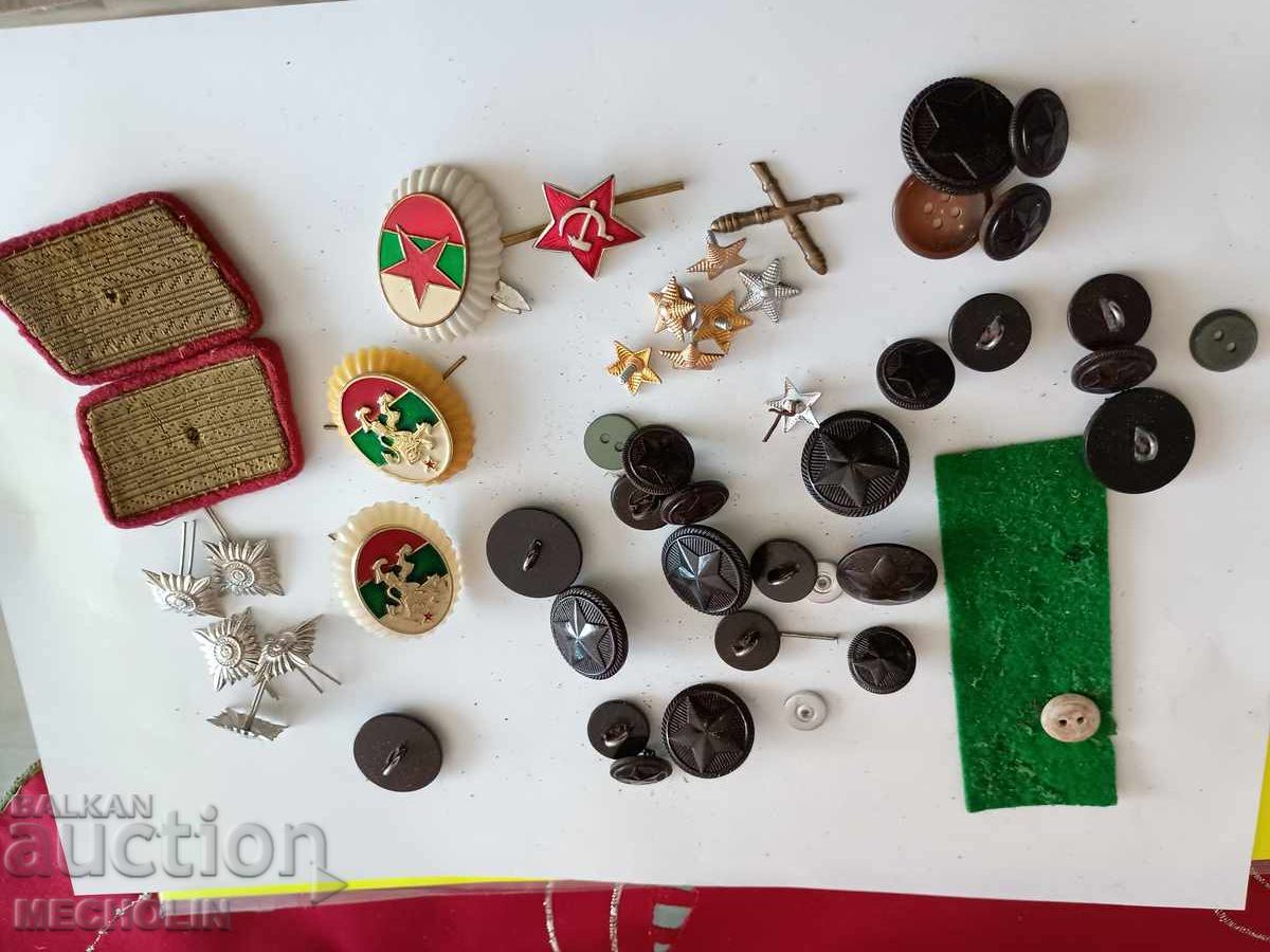 Old military cockades, badges, and buttons