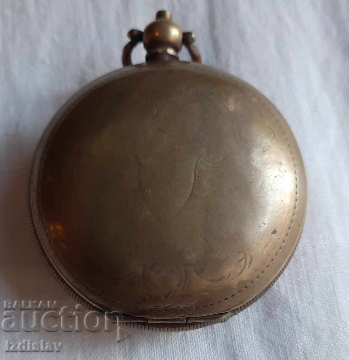 Auction  Bronze covers from an antique pocket watch