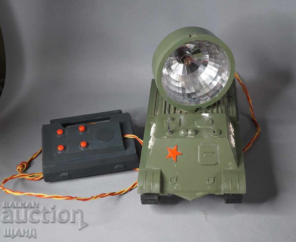 Old Russian plastic toy model tank with a spotlight