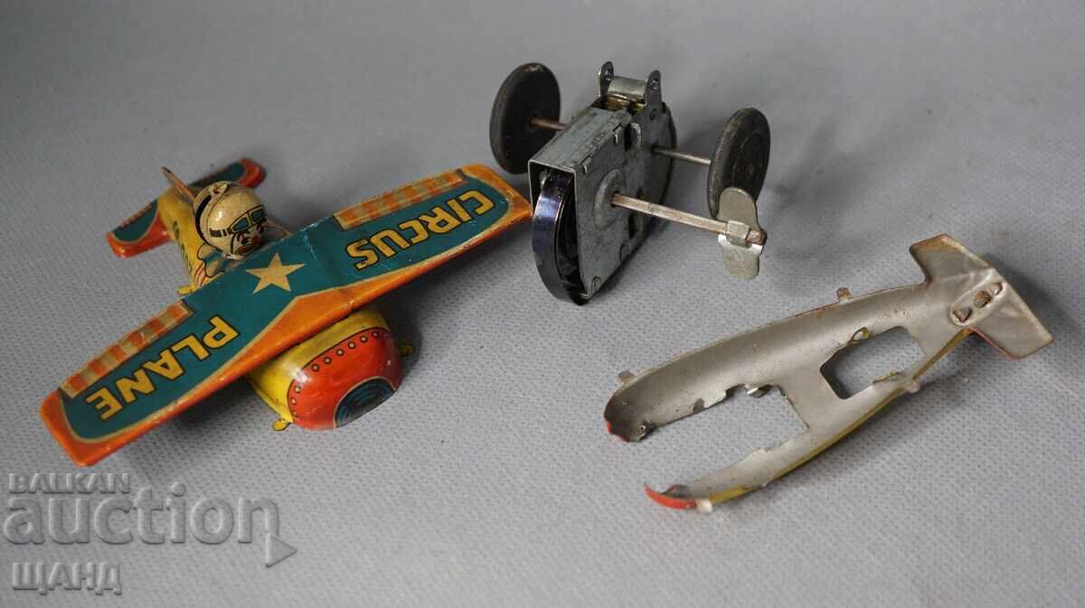 Delivery of Old Japanese metal mechanical toy circus airplane