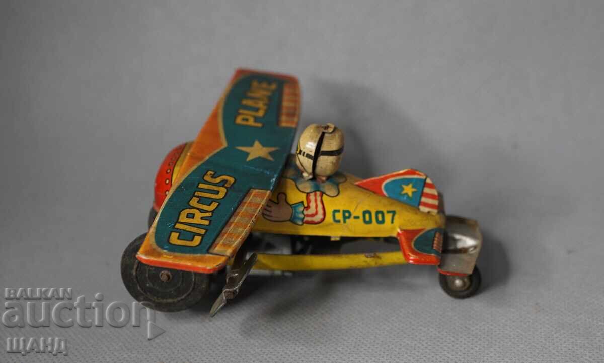 Old Japanese metal mechanical toy circus airplane