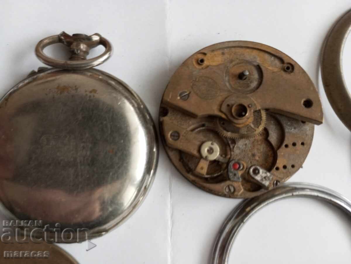 Παράδοση Παρτίδα μηχανισμών και καπακιών για ρολόγια τσέπης