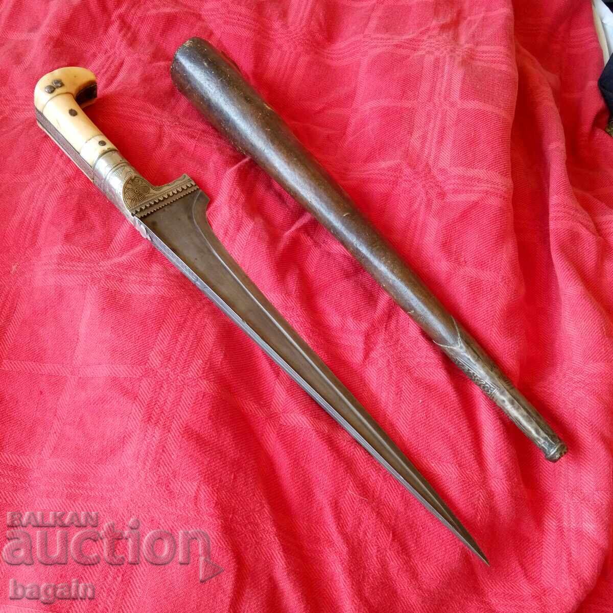 Auction  Belt piercing knife.