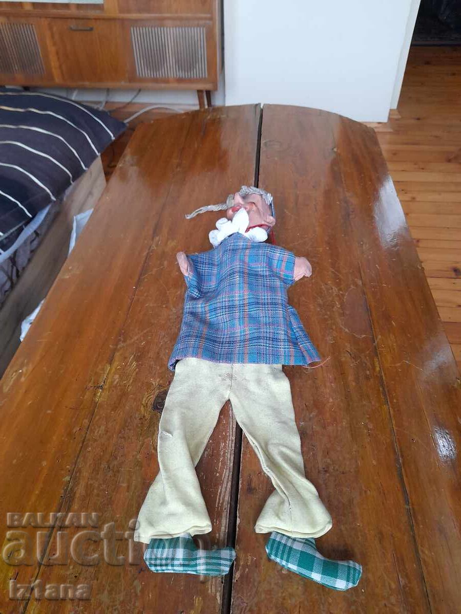 Old puppet theater doll Buratino, Pinocchio