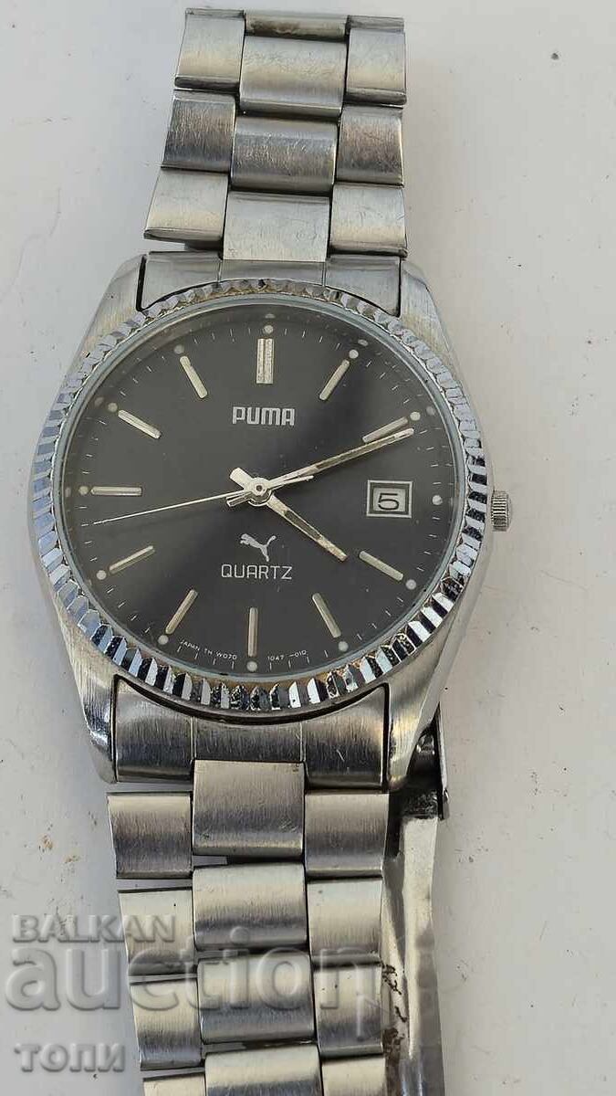 PUMA QUARTZ JAPAN RARE I DON'T KNOW IF IT WORKS BZC !!!!