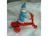Ламаринена механична играчка - Клоун палячо кара тротинетка