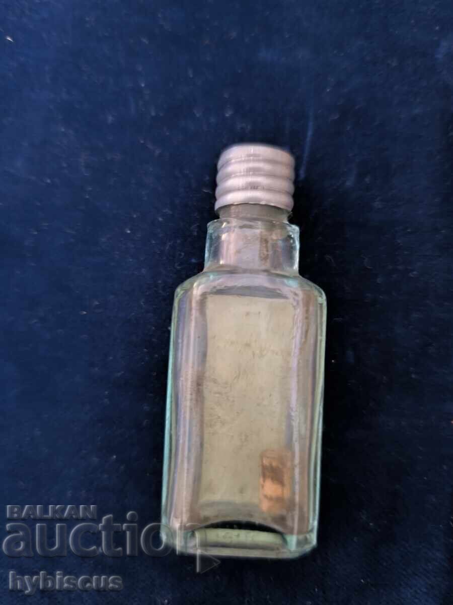 Auction  Old lubricating oil bottle from World War II