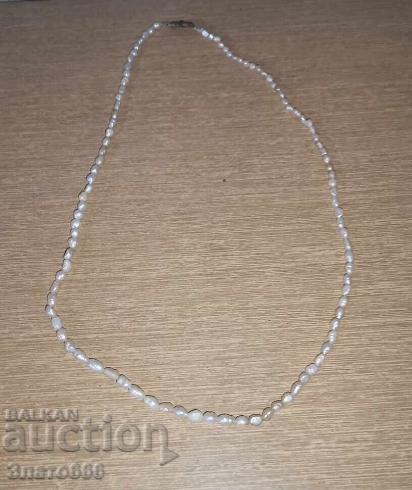 Old pearl necklace with price 5.00 €