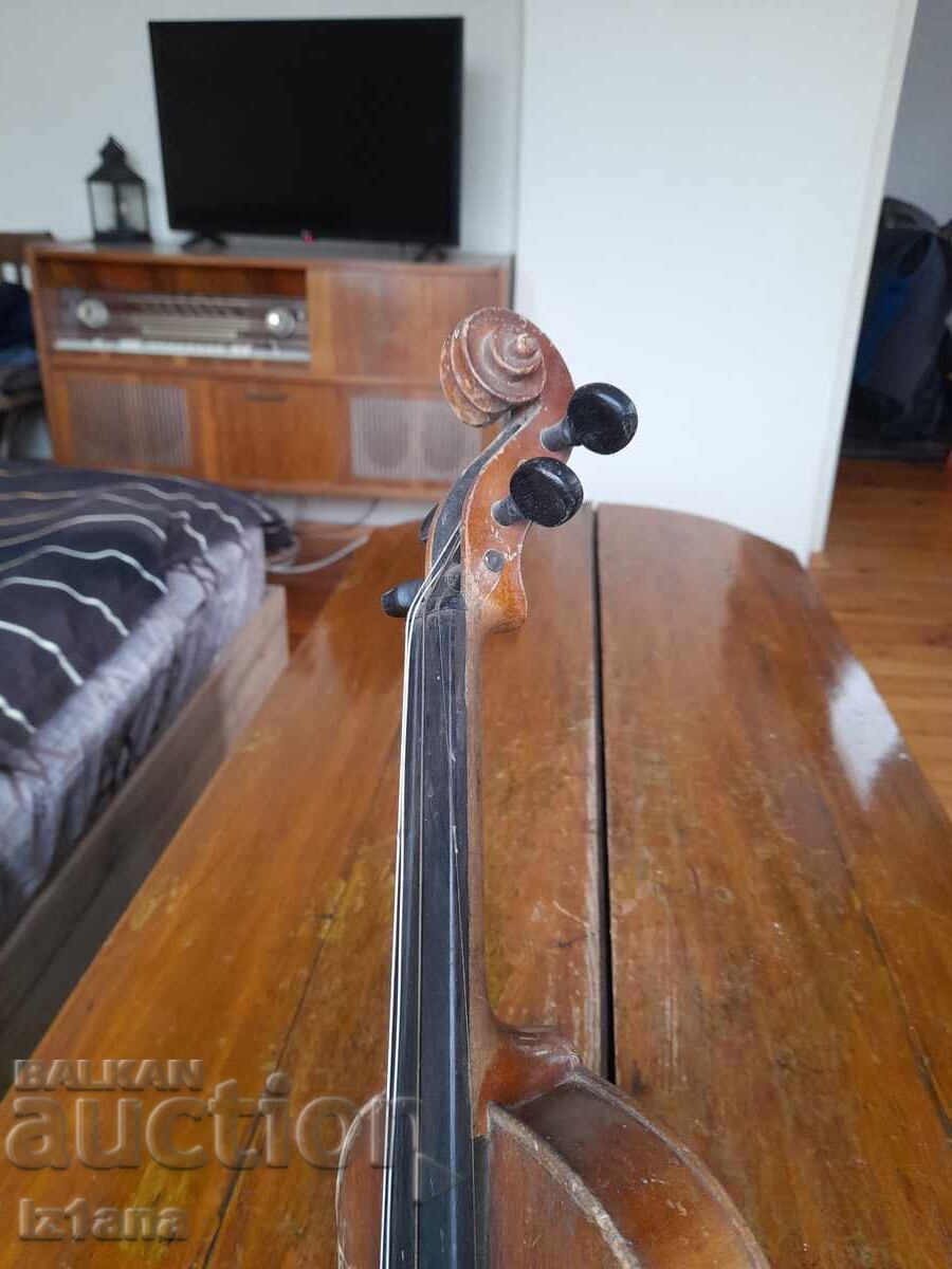 Auction  An old violin