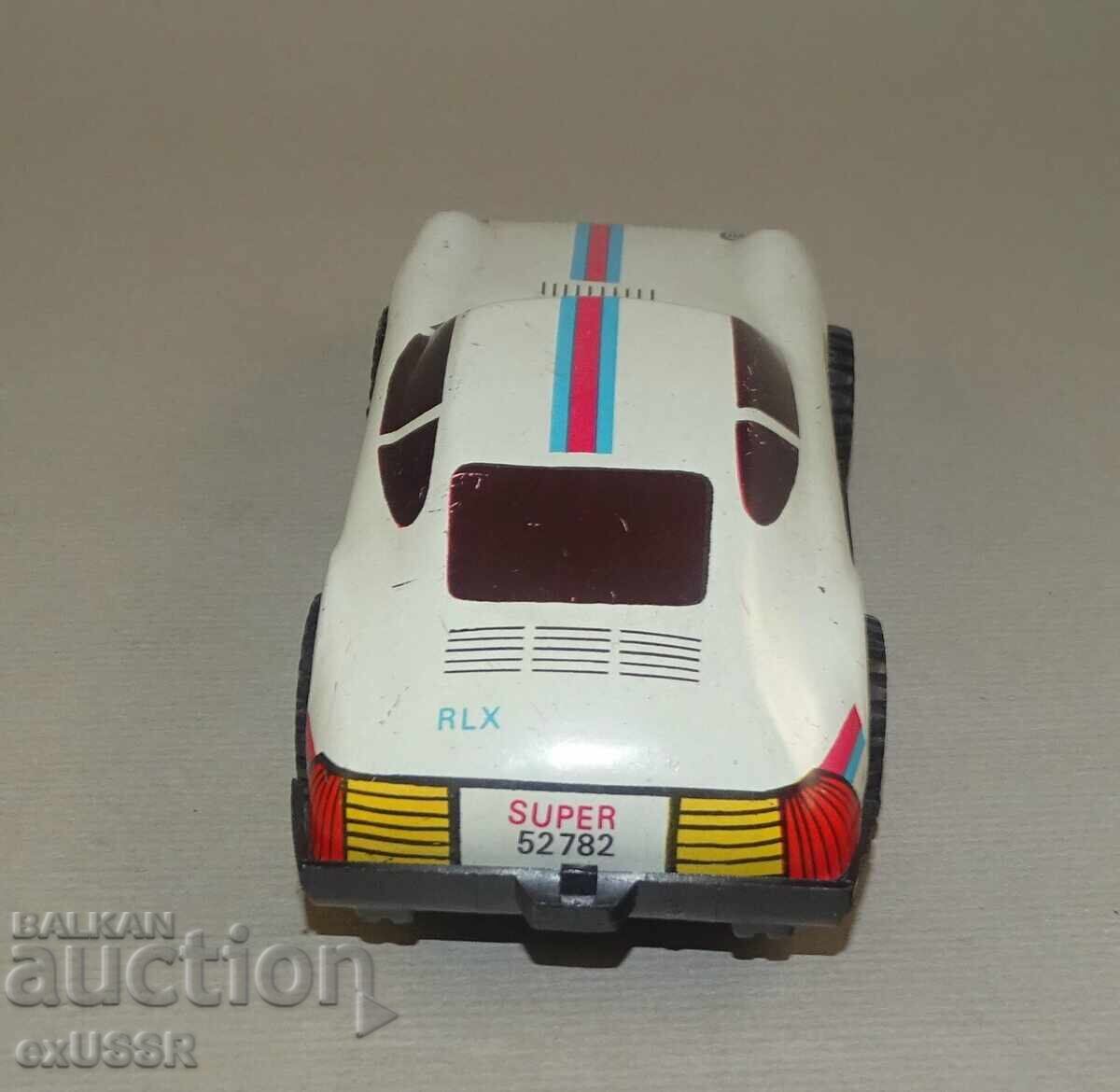 Delivery of Laminated toy Porsche Car Car