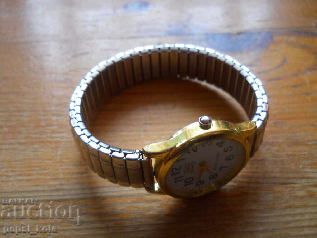 Livrarea Ceas de damă cu cuarț "Q&Q"