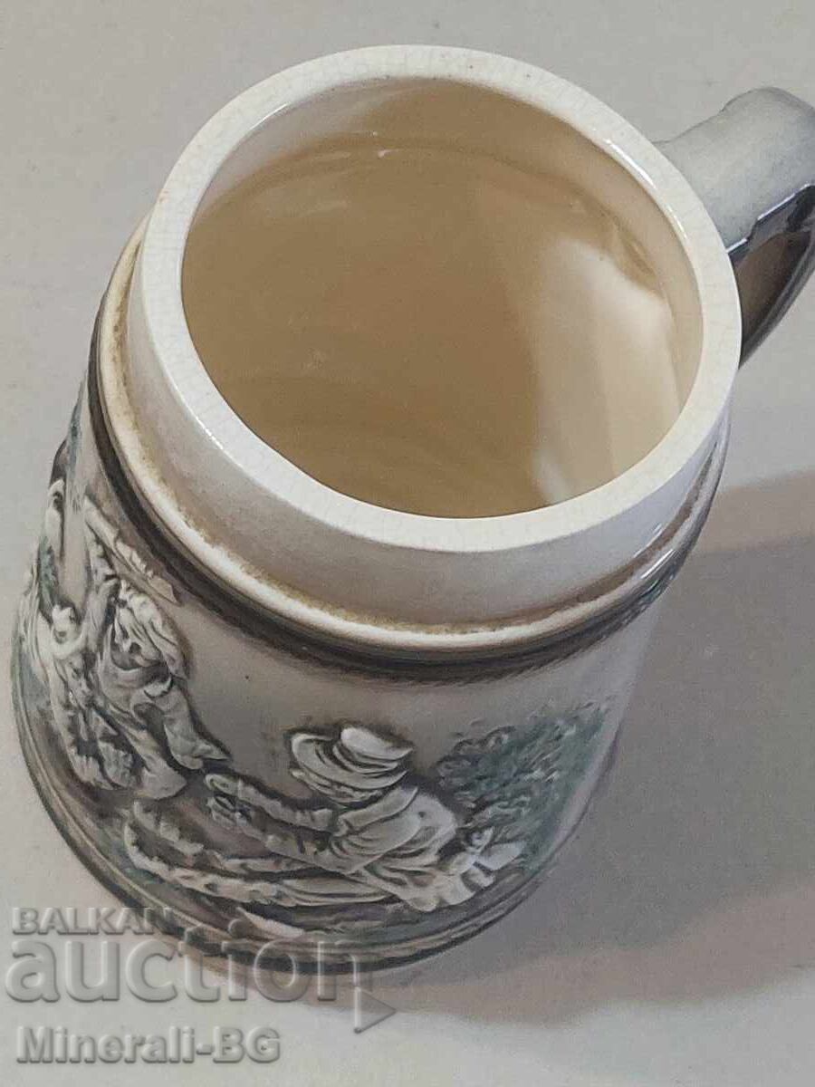 Old ornamented mug