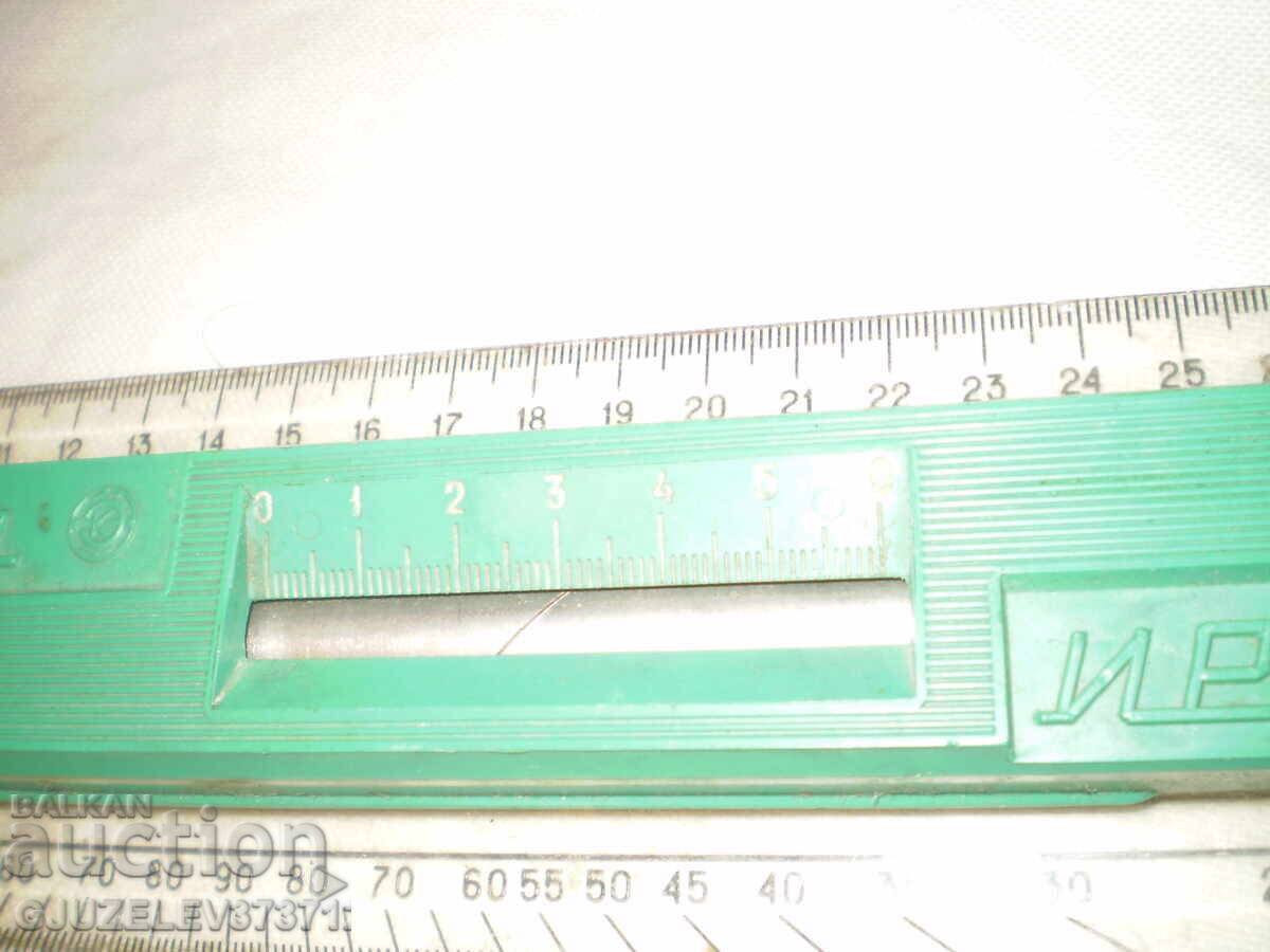 Auction  Retro Soviet parallel rolling ruler, green plastic