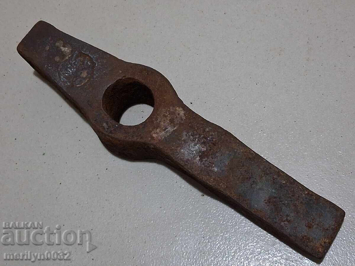 Delivery of Old mason's hammer, tool, pickaxe