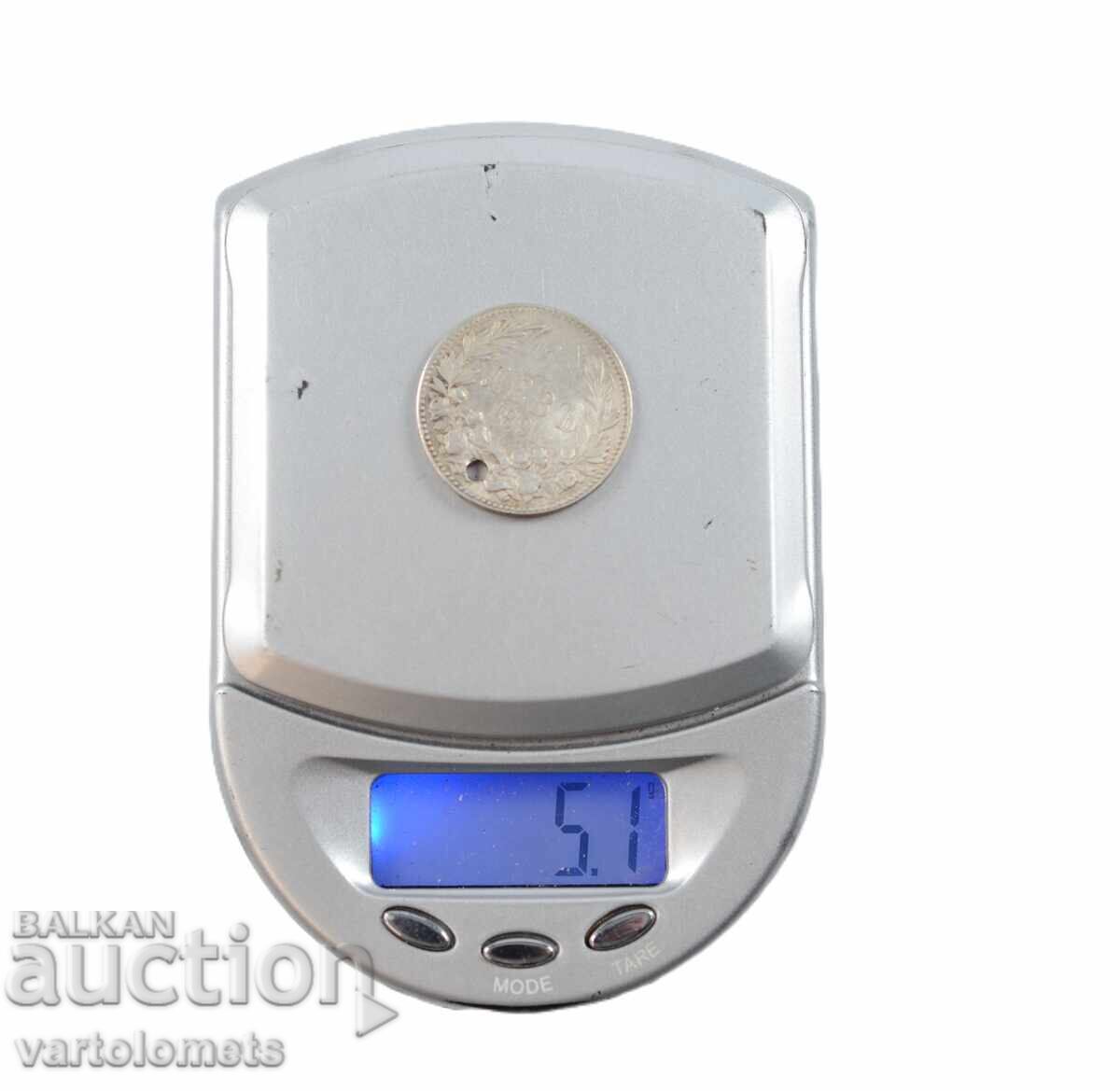 Licitație O monedă de argint