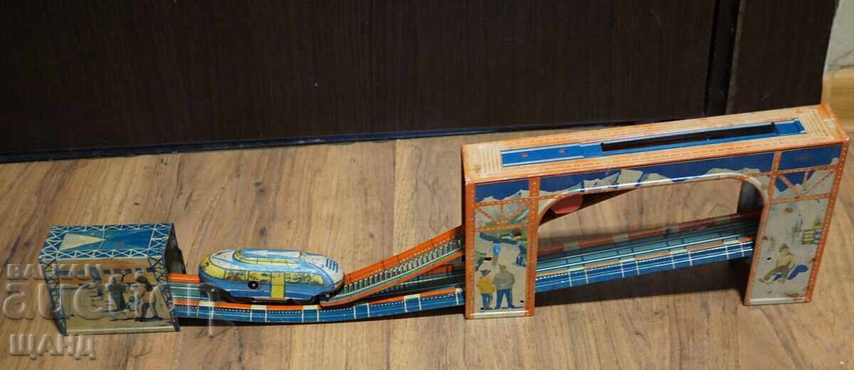 Licitație Vechiă jucărie mecanică rusească din metal, teleschi Licitație Vechiă jucărie mecanică rusească din metal, teleschi