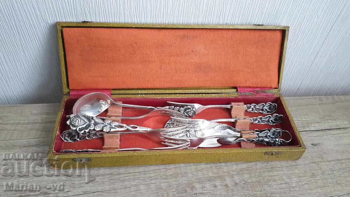 Set of silver-plated dessert forks and serving utensils