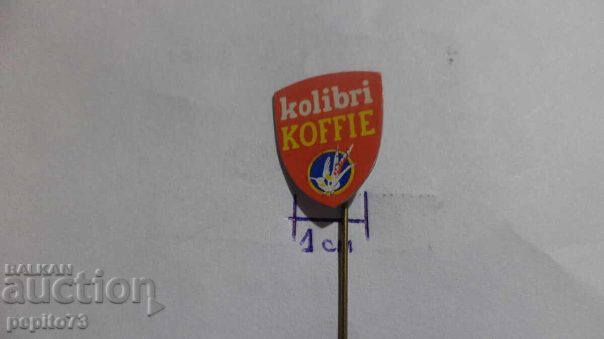 Emblemă publicitară kolibri Koffie, marcă de cafea cu preț € 0.50 | 0.98 BGN Emblemă publicitară kolibri Koffie, marcă de cafea cu preț € 0.50 | 0.98 BGN