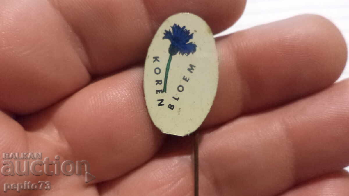 Διαφημιστικό σήμα, Koren Bloem, μπλε καλαμπόκι