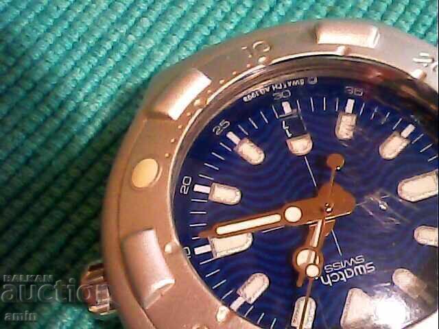 Livrarea Frumos ceas Swatch, funcționează perfect, cu baterie nouă