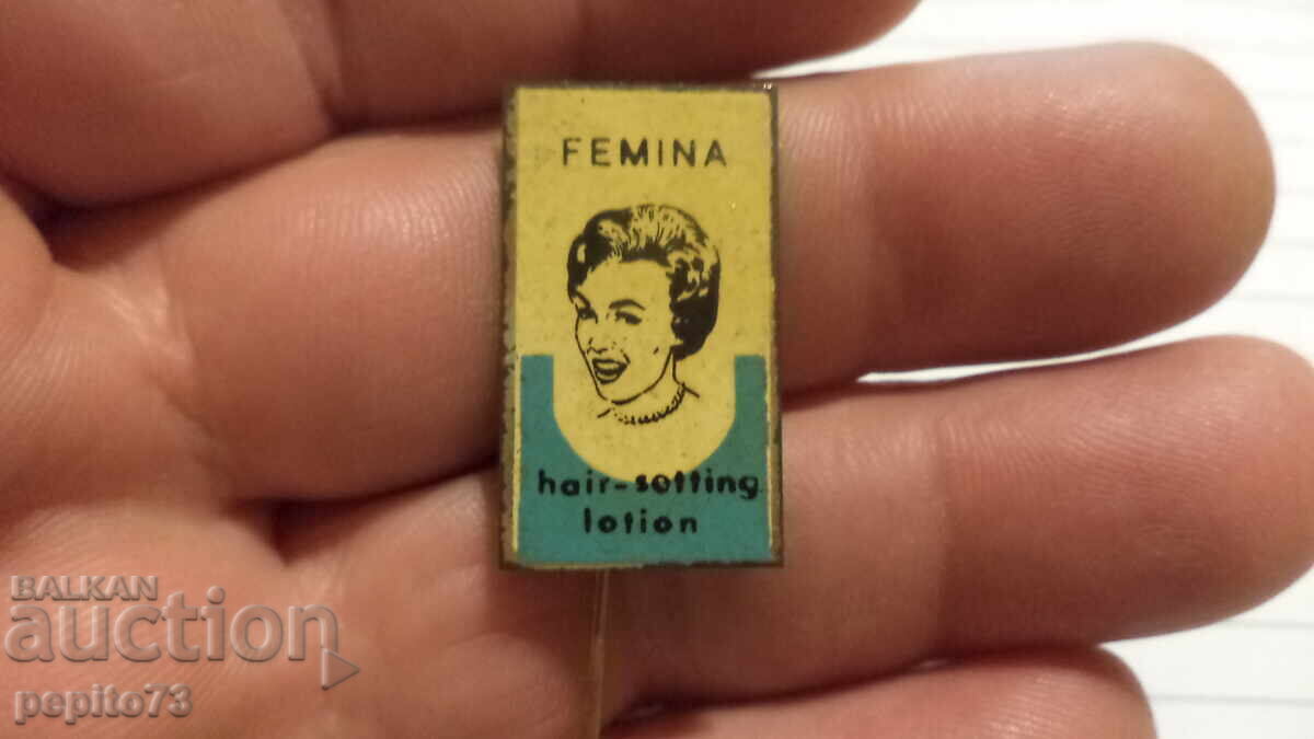 Insigna publicitară, Femina, marcă de lac de păr