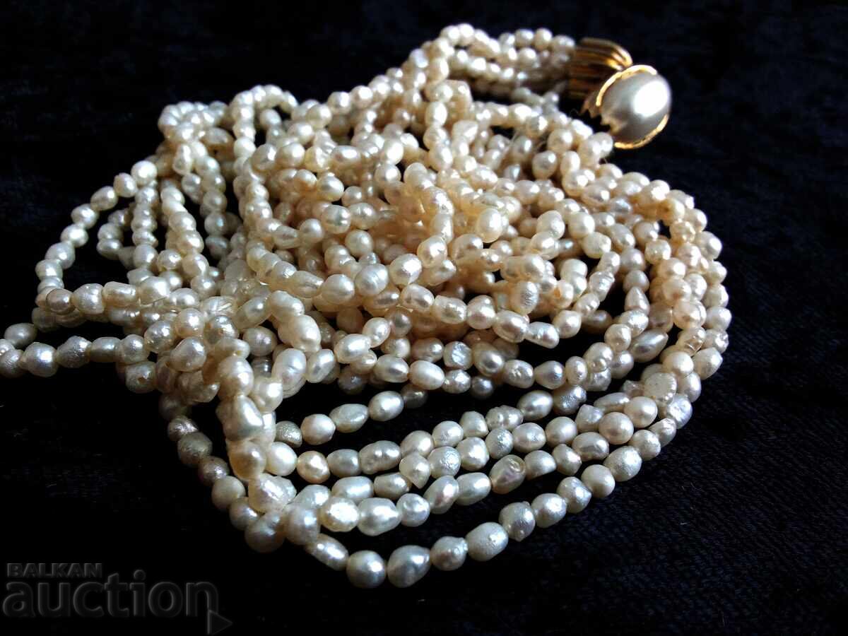 Delivery of Freshwater Rice Pearl Necklace Delivery of Freshwater Rice Pearl Necklace