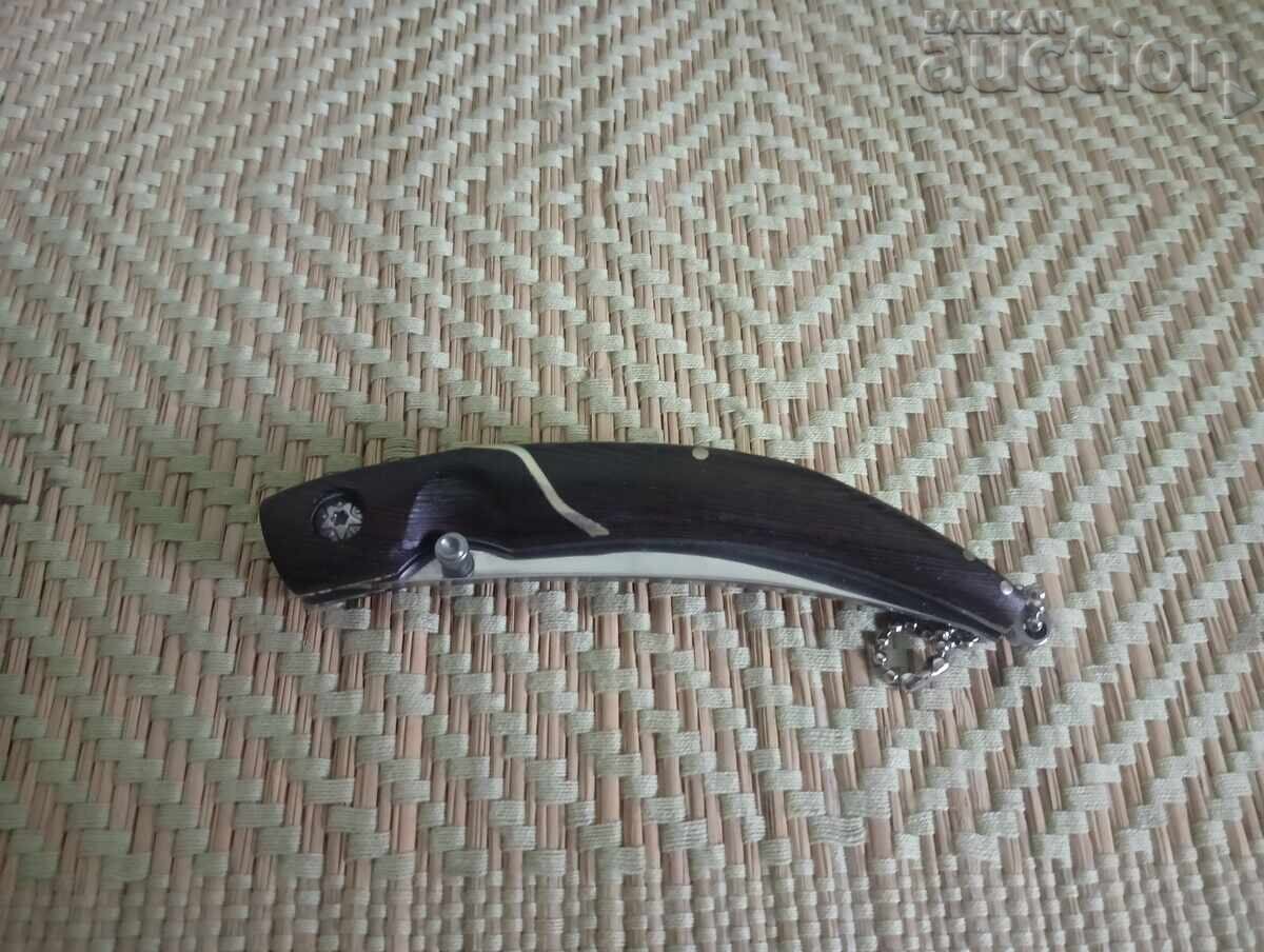 Елегантен сгъваем нож с извито острие и ергономична дръжка - 6 Елегантен сгъваем нож с извито острие и ергономична дръжка - 6