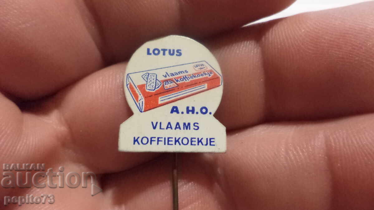 Insigna publicitară, Lotus A.H.O, marcă de biscuiți Insigna publicitară, Lotus A.H.O, marcă de biscuiți