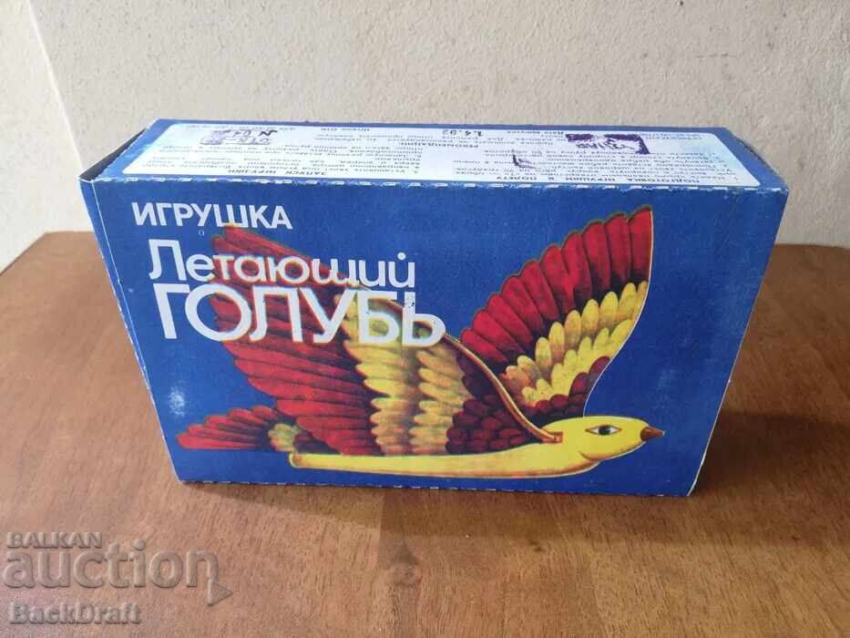 Licitație Jucărie sovietică pentru copii din plastic rusesc cu cutie - Porumbelul zburător
