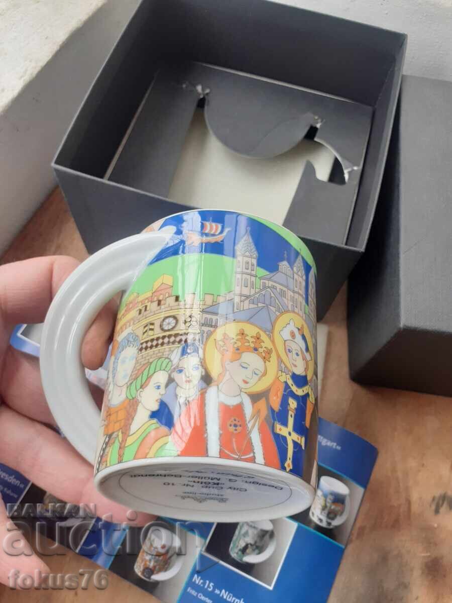 Licitație Ceașcă de colecție din porțelan - Rosenthal cu cutie și broșură Licitație Ceașcă de colecție din porțelan - Rosenthal cu cutie și broșură