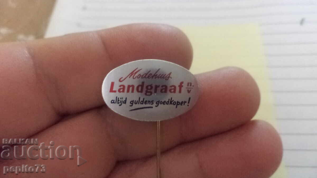 Διαφημιστικό σήμα, Modehuus lanbgraaf, καταστήματα ρούχων