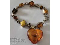 Silver bracelet with multicolored amber