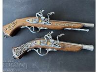 Pair of replica flintlock pistols in good and preserved condition
