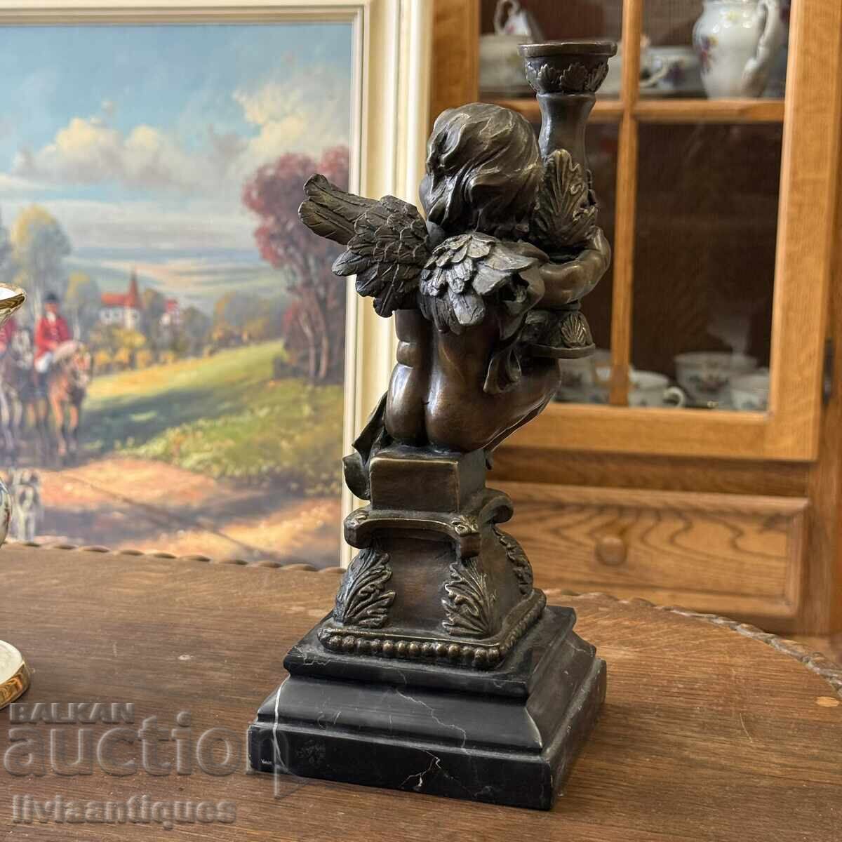 Livrarea Cupidon de bronz Livrarea Cupidon de bronz