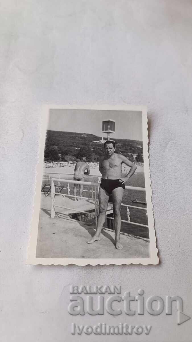 Fotografie Bărbat pe ponton