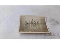 Φωτογραφία Νεαροί άνδρες στη θάλασσα