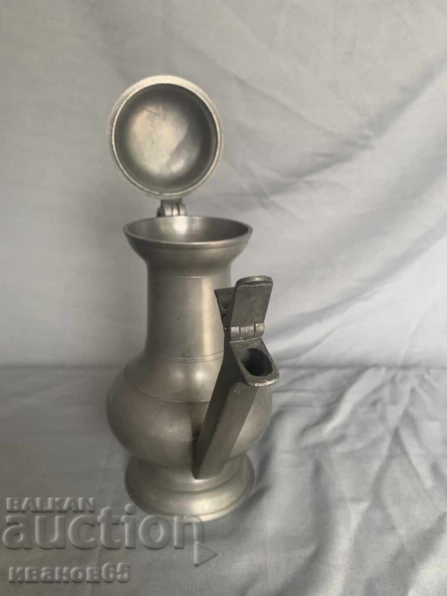 Livrarea Ceainic vechi de cositor