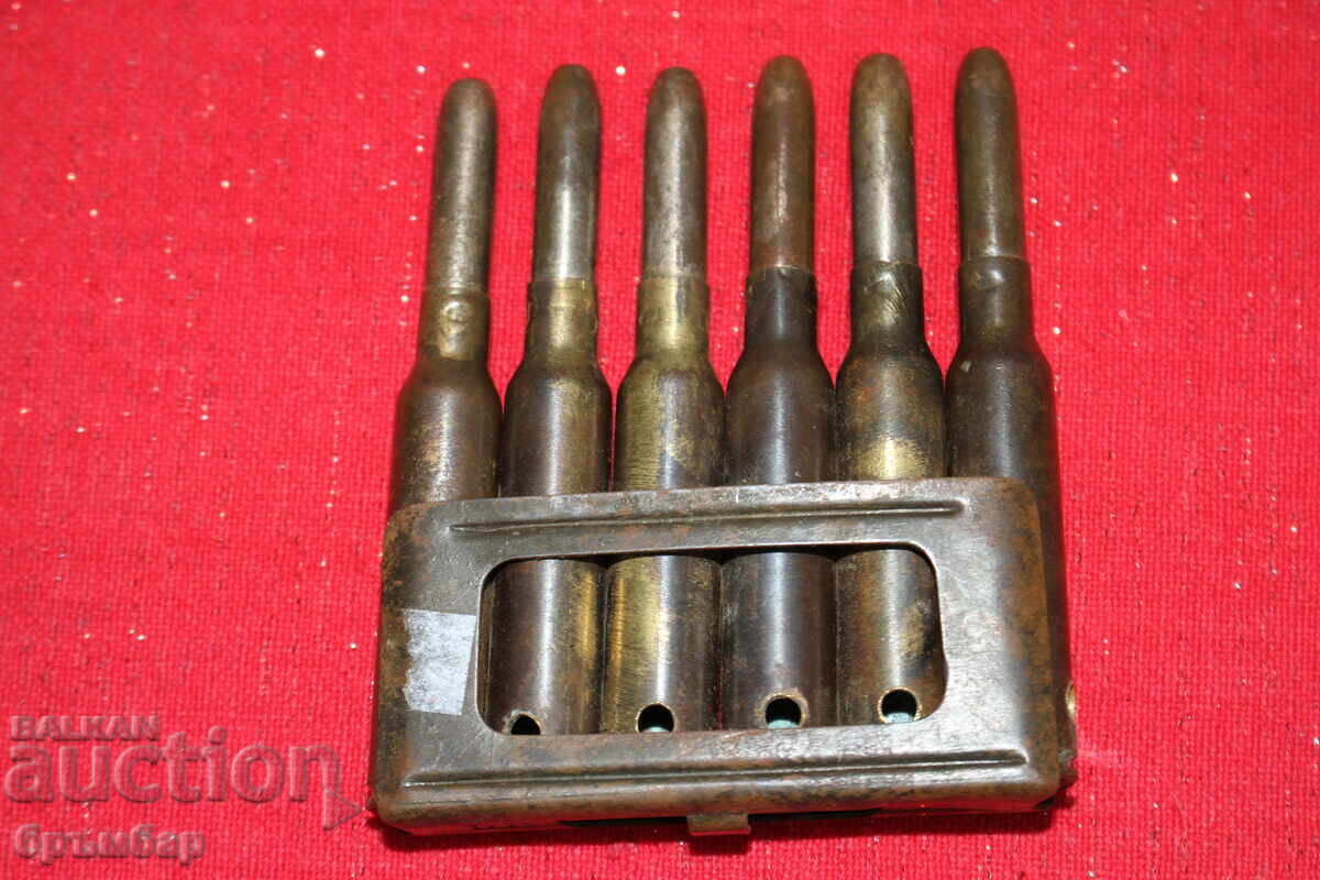 Încărcător clips pentru Carcano. Securizat. Tuburi cartuș perforate Încărcător clips pentru Carcano. Securizat. Tuburi cartuș perforate