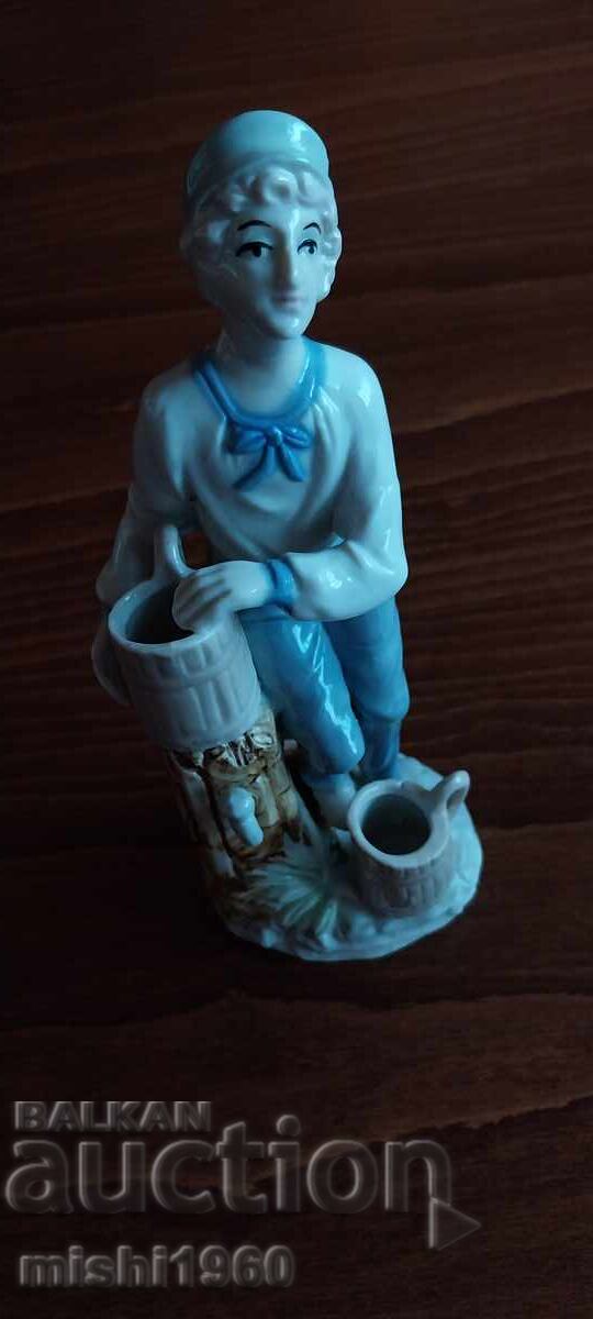 Livrarea Figurină de porțelan Livrarea Figurină de porțelan