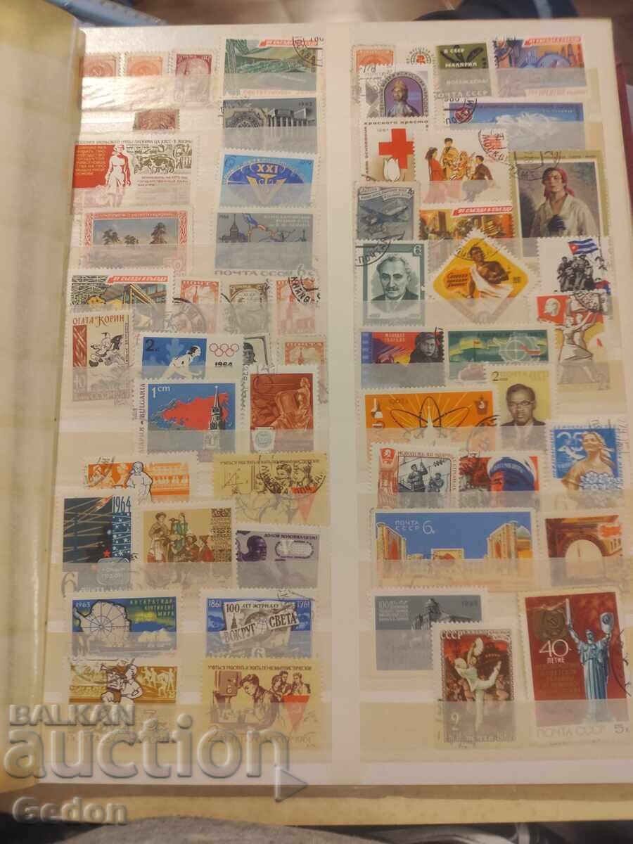 Auction  Binder with about 250 postage stamps from all over the world