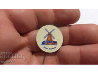 Znachka reklamna Zaanse Olimolen, vid moară de vânt de ulei