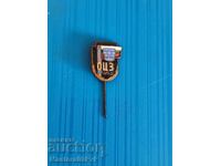 Insigă-bronz-mailovă