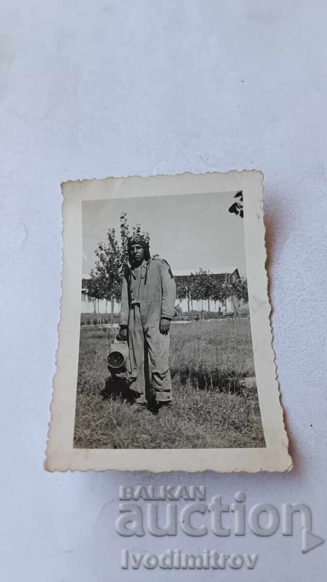 Photo of a Pilot in an Airplane with a Mobile Spotlight