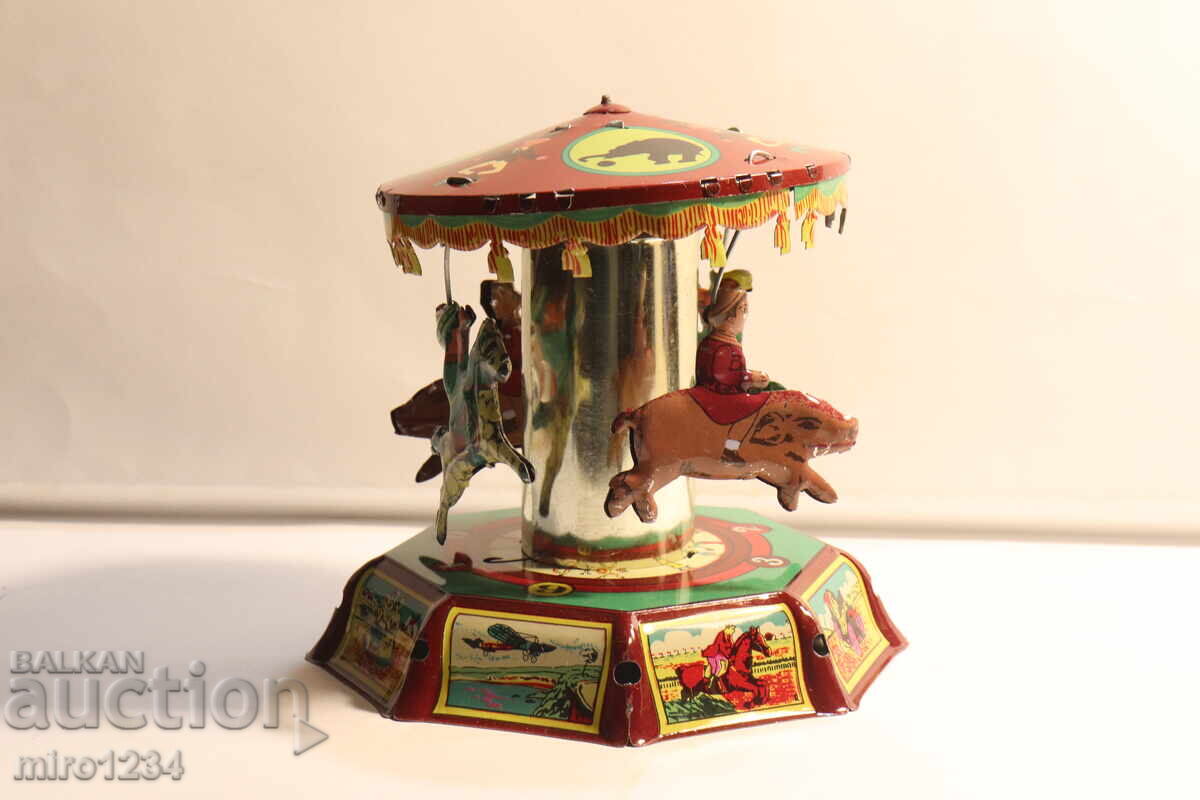 ЛАМАРИНЕНА ТЕНЕКИЕНА  МЕХАНИЧНА  ИГРАЧКА  ВЪРТЕЛЕЖКА