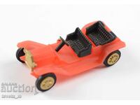 Plastic toy car model of an antique car