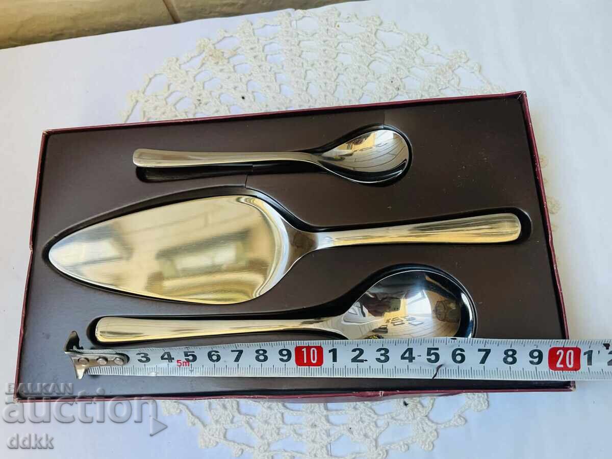 Auction  New serving utensils from Germany in a box, with markings