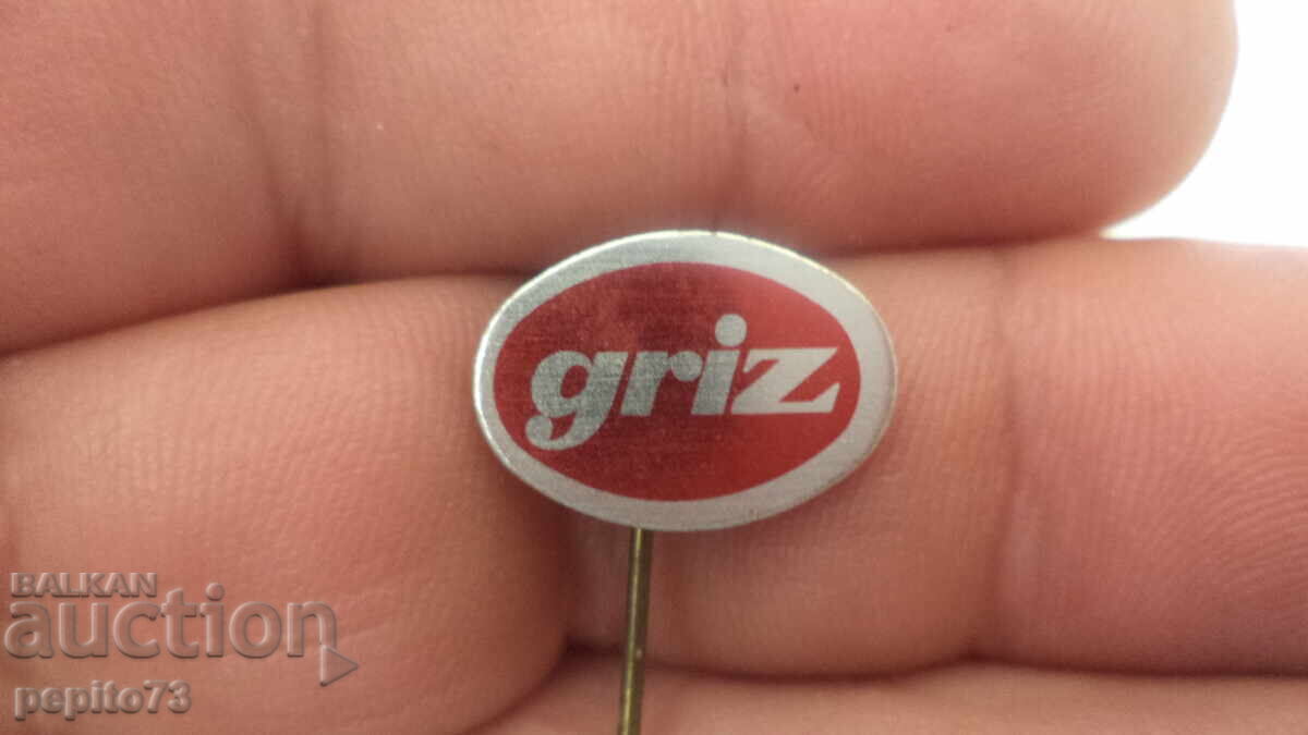 Insigna publicitară, Griz, marcă accesorii sportive Insigna publicitară, Griz, marcă accesorii sportive