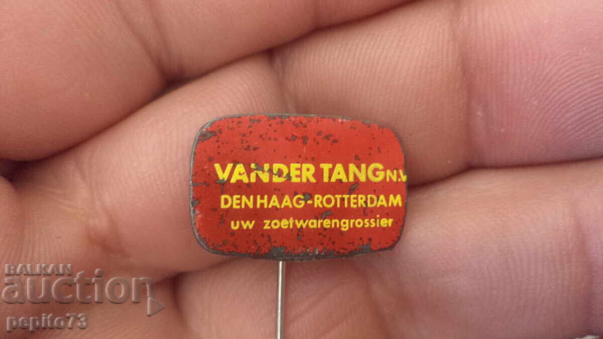 Insigna publicitară, Vander Tang, companie de comerț en-gros